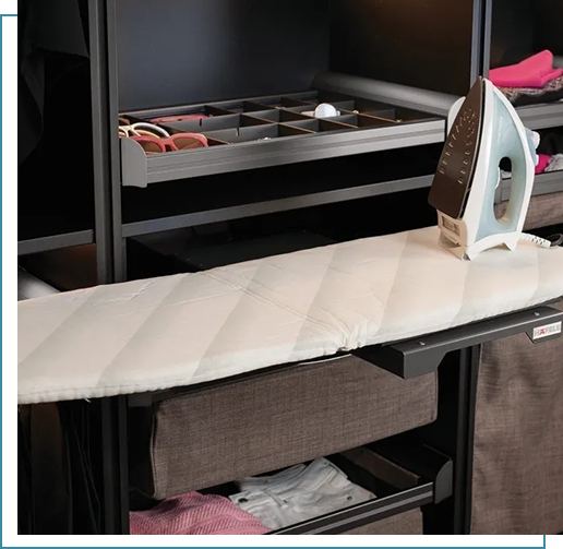 A white ironing board sitting on top of a table.